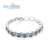 Sterling Silver Bracelet w/ 16 Blue Topazes -7.5"